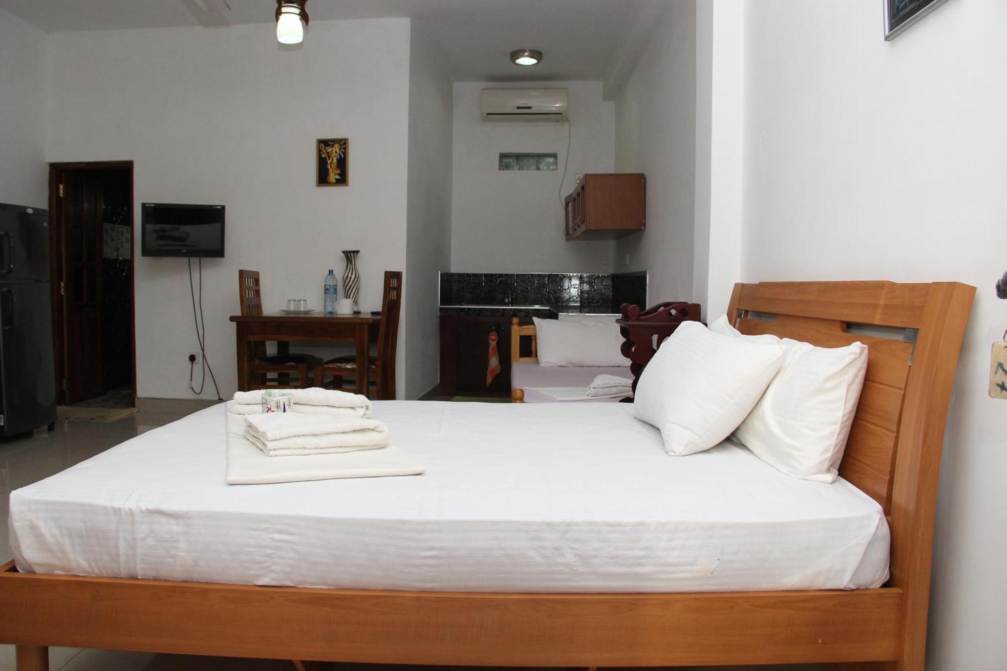 Shanith Guesthouse Negombo Rum bild